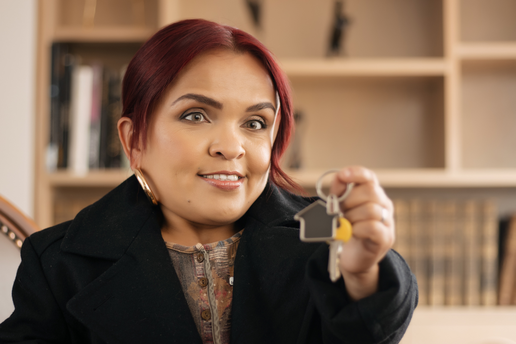 Real Estate Agent with Dwarfism Giving the Key